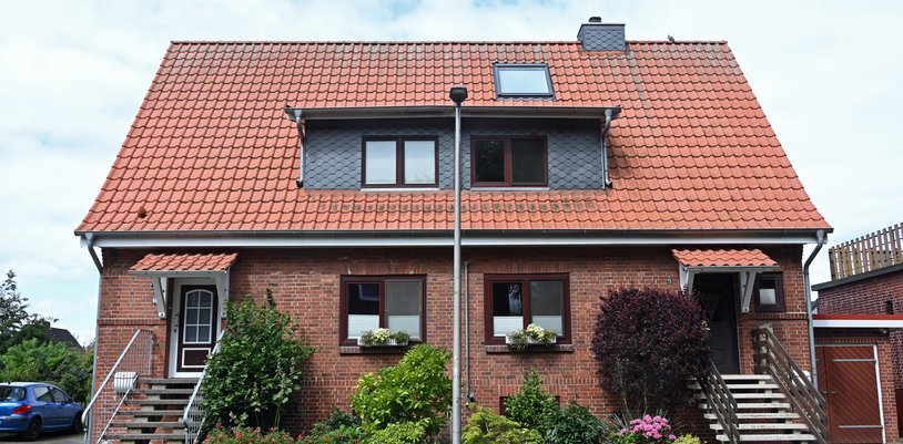 Doppelhaus als Eigentümergemeinschaft: Baumaßnahme ohne Beschluss rechtswidrig?
